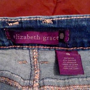 Mid-rise boot cut jeans